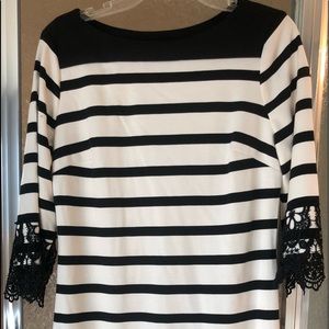 Black and white striped dress with lace trim